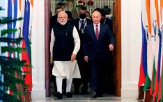 India signs trade and arms deals with Russia during Putin's visit to New Delhi