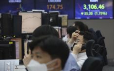 Asian stocks follow, Wall St lower