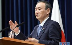 日本首相新年首次新闻发布会强调应对疫情紧迫性