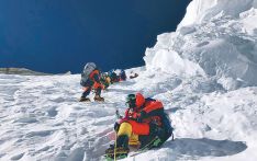 冬季探险挑战生命极限  尼泊尔登山者打破攀登世界第二高峰记录登上“野人山”