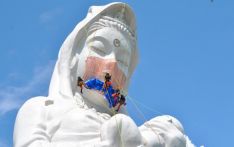 Giant Buddhist goddess in Japan gets face mask to pray for end of Covid-19