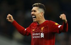 Roberto Firmino's last-minute header broke Tottenham's stubborn resistance at Anfield and sent Liverpool to the top of the Premier League table.
