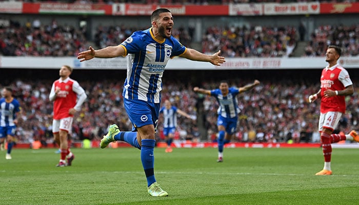 Brighton´s German striker Deniz Undav celebrates after scoring his teams second goal during the English Premier League football match between Arsenal and Brighton and Hove Albion at the Emirates Stadium in London on May 14, 2023.—AFP