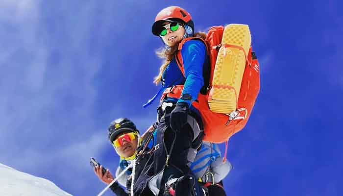Pakistani mountaineer Naila Kiani is pictured at the peak of worlds highest mountain, Mount Everest, with her fellow mountaineer. — Instagram/@naila._.kiani