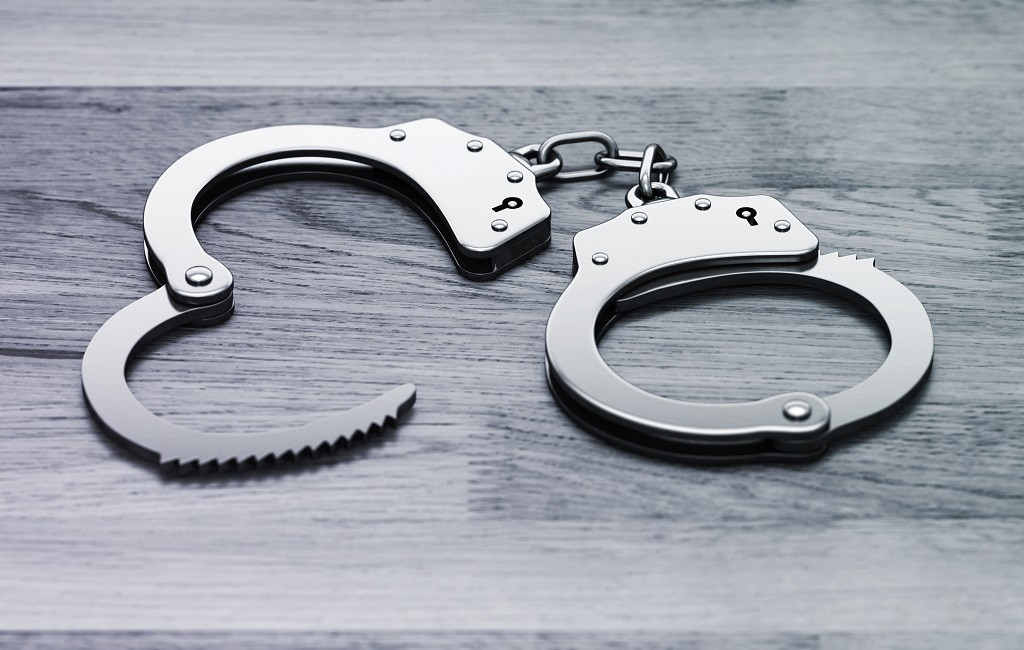 bigstock-police-metal-handcuffs-