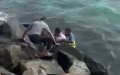 Police officers rescue man drifting at sea after fainting