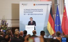 李强同德国总理朔尔茨共同出席第十一届中德经济技术合作论坛和中德企业家圆桌会