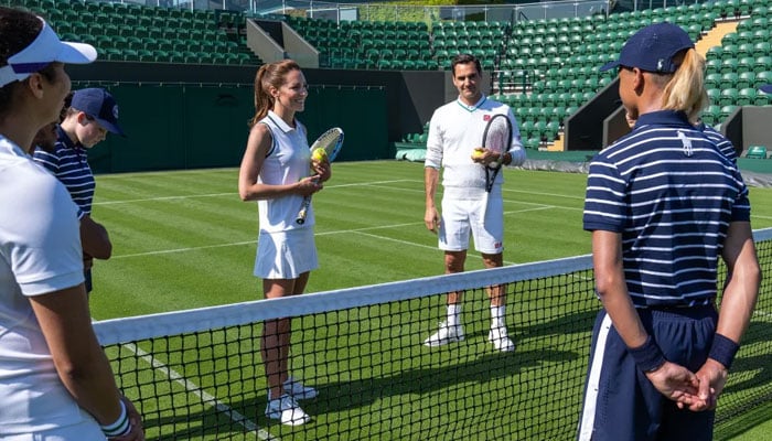 Kate and Roger Federer met with some of Wimbledons ball boys and girls.—CNN