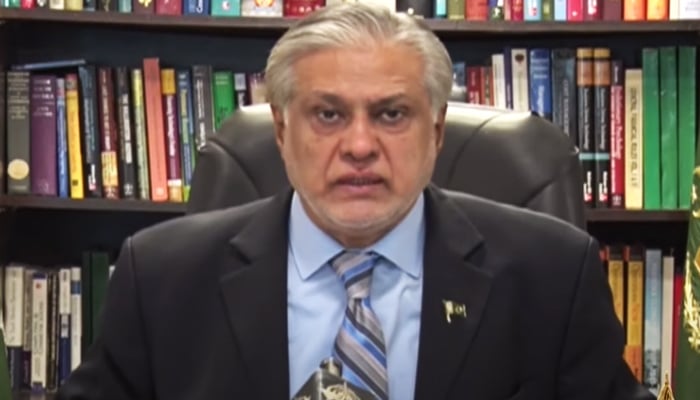 Finance Minister Ishaq Dar addressing a press conference in Islamabad, on July 13, 2023, in this still taken from a video. — YouTube/PTVNewsLive