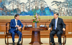 Xi meets former Philippine president