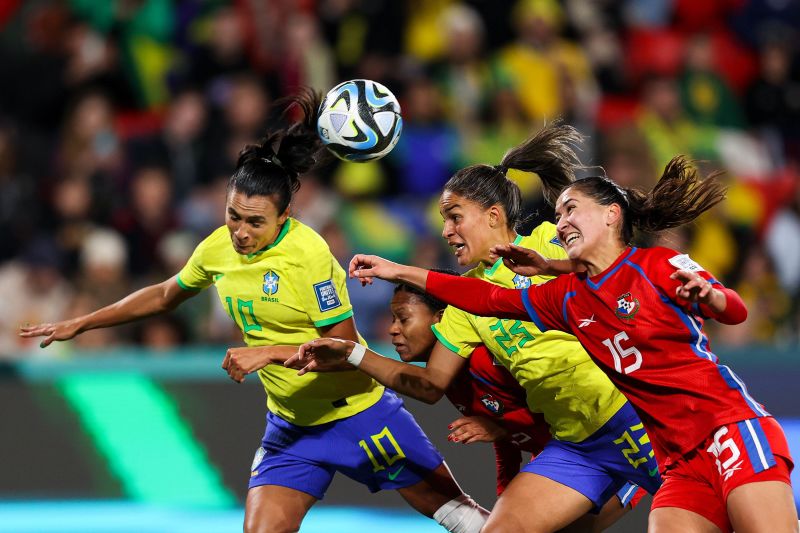 Brazil's Marta, left, heads the ball during a match against Panama on July 24. <a href="https://edition.cnn.com/2023/07/23/football/brazil-germany-panama-morocco-womens-world-cup-2023-spt-intl/index.html" target="_blank">Brazil won 4-0</a>.