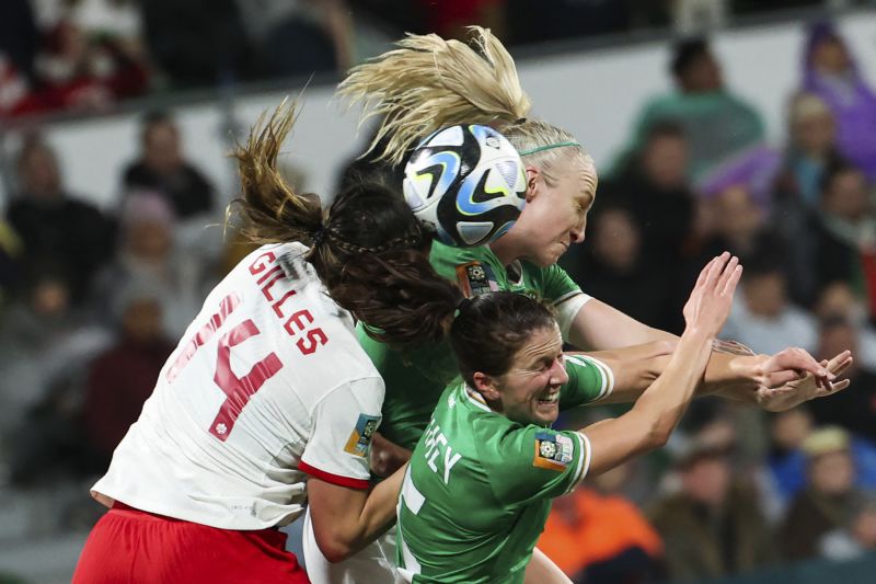 Canada's Vanessa Gilles competes for a header with Ireland's Niamh Fahey, bottom, and Louise Quinn during a match on July 26. <a href="https://www.cnn.com/2023/07/25/football/canada-spain-japan-2023-womens-world-cup-spt-intl/index.html" target="_blank">Canada won 2-1</a>.