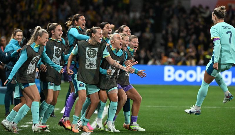 Australian defender Stephanie Catley, right, celebrates with teammates after scoring her team's fourth goal against Canada on Monday, July 31. <a href="https://www.cnn.com/2023/07/31/football/australia-canada-womens-world-cup-spt-intl/index.html" target="_blank">Australia won 4-0</a> to book a spot in the round of 16.