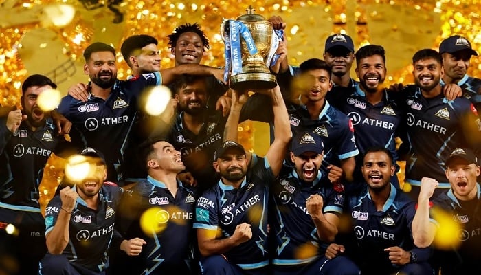 Gujarat Titans players celebrate with the IPL trophy, Ahmedabad, India, May 29, 2022. —BCCI/IPL/File