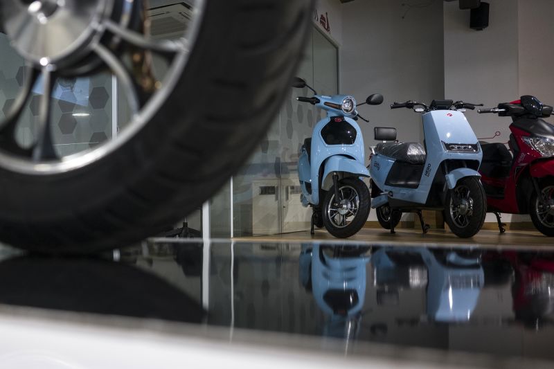 Electric two-wheelers on display at the Hero Electric Vehicles headquarters in Gurgaon, India, in 2021. Hero is one of dozens of manufacturers benefiting from the shift to EVs across the country. 