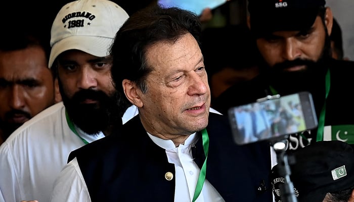 Former Prime Minister and PTI Chairman Imran Khan while departing from the court. — AFP/File