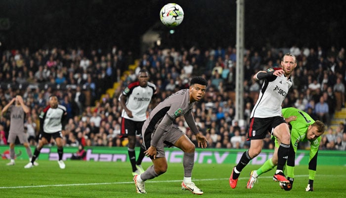 Fulham´s Canadian defender #44 Luc de Fougerolles eyes the ball during the English League Cup football match between Fulham and Tottenham Hotspur at Craven Cottage stadium, in London, on August 29, 2023. AFP