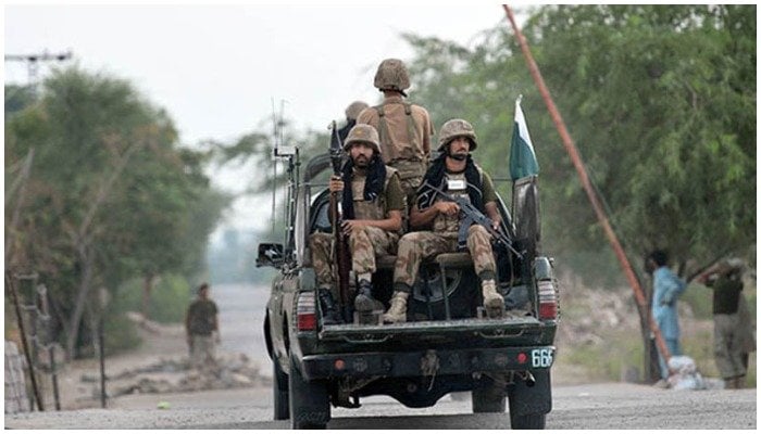 Soldiers travelling in a military vehicle in this undated picture. — AFP/File