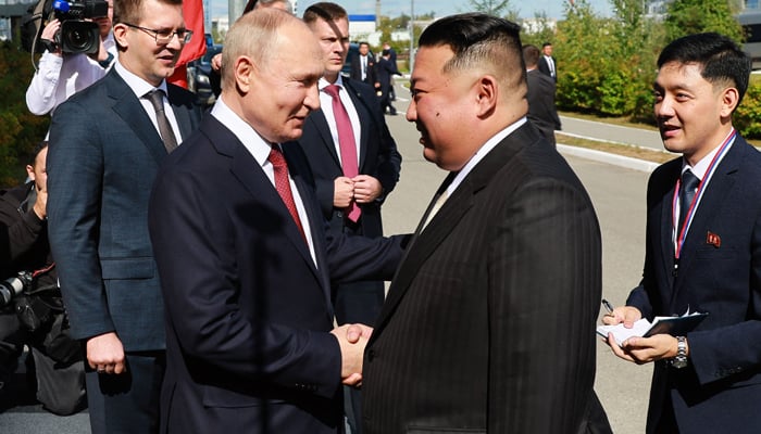 In this photo, Russias President Vladimir Putin (C-L) shakes hands with North Koreas Kim Jong Un (2nd R) during their meeting at the Vostochny Cosmodrome in Amur region on September 13, 2023. — AFP