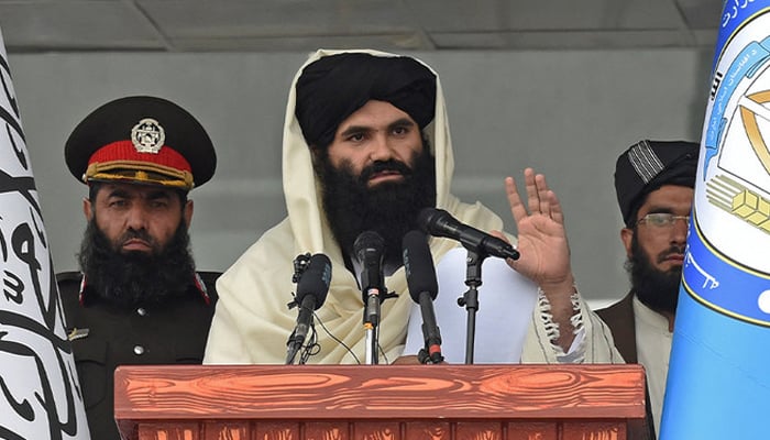 Taliban Interior Minister Sirajuddin Haqqani speaks to new Afghan police recruits during a graduation ceremony at the police academy in Kabul. — AFP/File