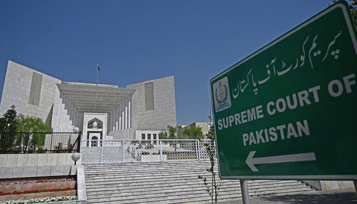 The Supreme Court of Pakistans sign board indicates the building of the apex court in Islamabad. — AFP/File