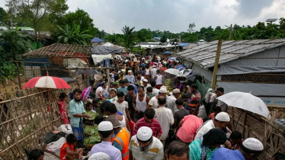 FILE IMAGE: People walk through a marketplace at a Rohingya refugee camp in Cox`s Bazar, Bangladesh, on Wednesday, August 11, 2021 Allison Joyce/Dhaka Tribune