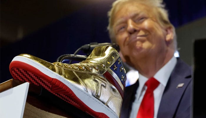 Former US president Donald Trump at Sneaker Con unveiling his line of Trump Sneakers. — AFP/File