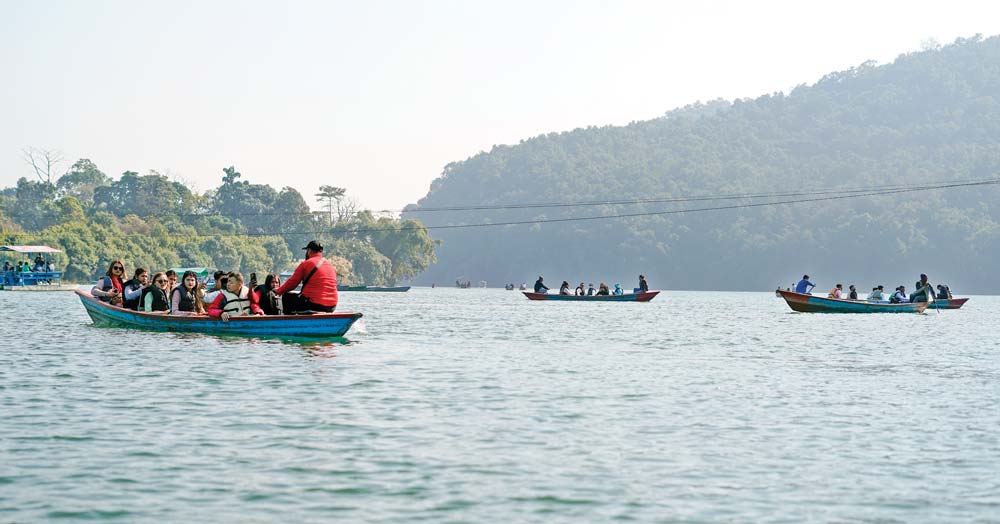tourist-enjoying-boating_Pokhara_Sagar_SGR4242