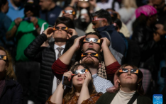People watch solar eclipse across North America