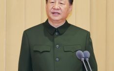 Xi presents flag to PLA's information support force