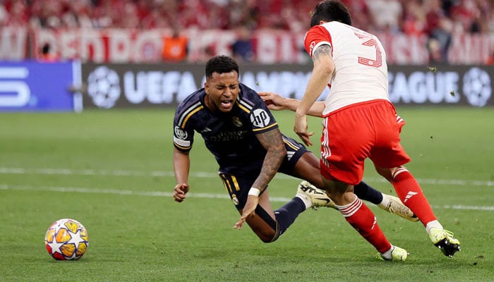 Rodrygo of Real Madrid is fouled by Kim Min-Jae of Bayern Munich which results in a penalty. — AFP File