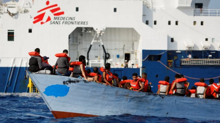 File Photo: A group of 61 migrants on a wooden boat are rescued by crew members of the Geo Barents migrant rescue ship, operated by Medecins Sans Frontieres (Doctors Without Borders), in international waters off the coast of Libya in the central Mediterranean Sea on September 28, 2023 Photo: Reuters