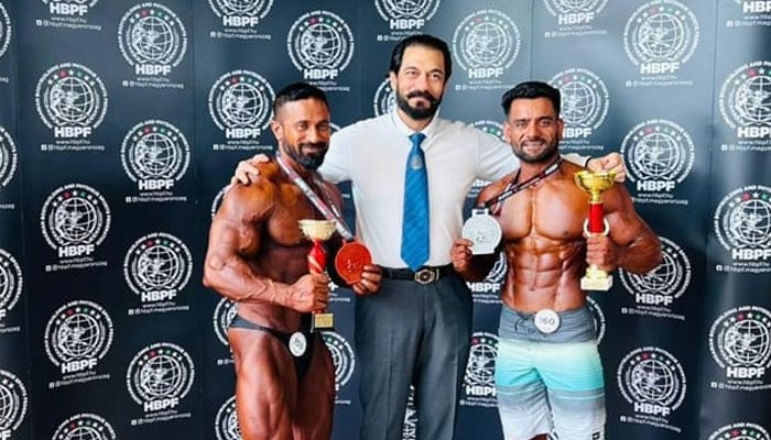 Bodybuilders with General Secretary of the Pakistan Bodybuilding Federation (PBBF), Sohail Anwar. — Author