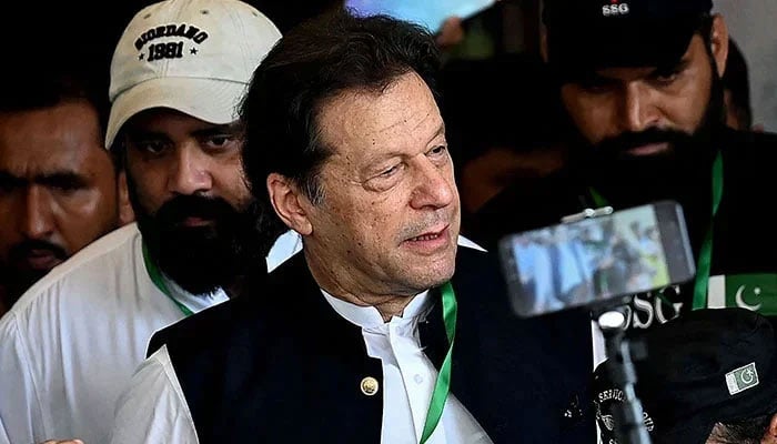 Former prime minister and PTI founder Imran Khan while departing from the court. — AFP/File