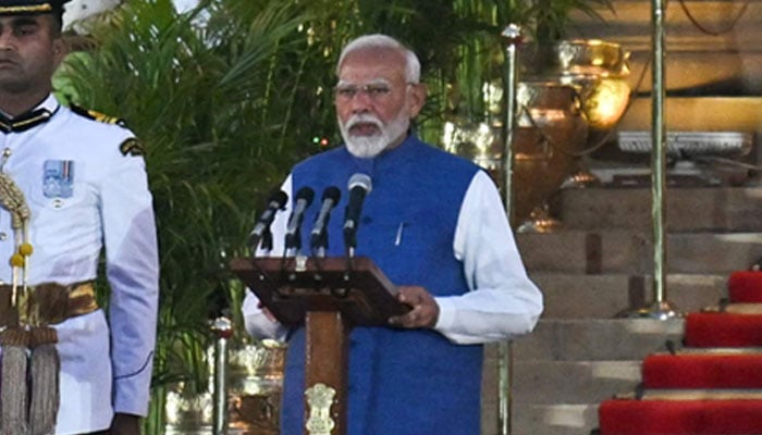 BJP leader Narendra Modi takes the oath of office for a third term as the country´s Prime Minister during the oath-taking ceremony administered by President Droupadi Murmu (not pictured) at presidential palace Rashtrapati Bhavan in New Delhi on June 9, 2024. — AFP