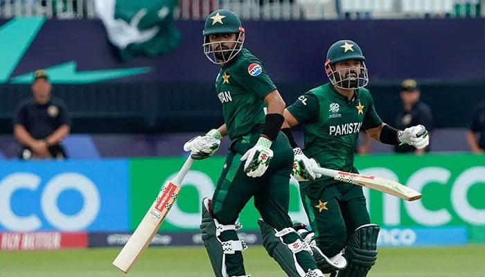 Pakistan´s captain Babar Azam and Pakistan´s Mohammad Rizwan run between the wickets during the ICC men´s Twenty20 World Cup 2024 group A cricket match between Pakistan and Canada at Nassau County International Cricket Stadium in East Meadow, New York on June 11, 2024.— AFP