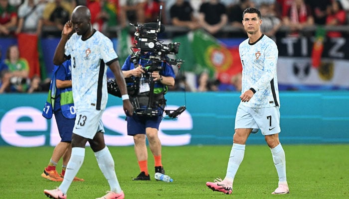 Portugal´s forward #07 Cristiano Ronaldo reacts after his team lost the UEFA Euro 2024 Group F football match between Georgia and Portugal at the Arena AufSchalke in Gelsenkirchen on June 26, 2024.