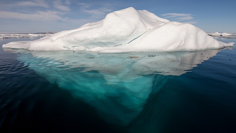 Iceberg_in_the_Arctic_with_its_underside_exposed