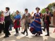 Tourists enjoy immersive experience of ethnic culture in Kunming