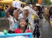 Quake recovery blunts water festival