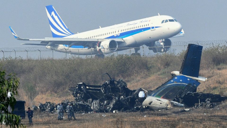 AFP__20180313__12F5AV__v6__MidRes__TopshotNepalBangladeshAccidentAviation-7kj6ddz2f5jg4g7gcakwk96wirzf5o4wvbgwlbpl8hs