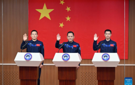 Astronauts of China's Shenzhou-21 mission meet press