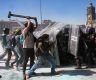 Thousands protest against government in Mexico as clashes leave 120 injured