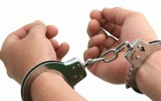 Two arrested on charge of taking youth hostage