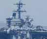 US carrier shoots down Iranian drone as tensions escalate and diplomatic talks hit a snag