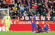 Barca suffer title defence blow in Girona derby defeat