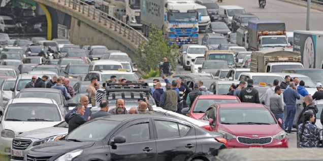 Protesters block Beirut roads after fuel tax hike