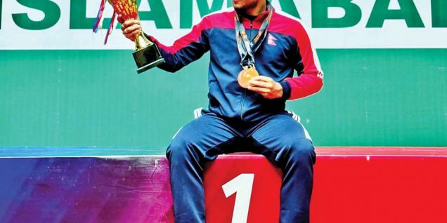 Dahal shines with double Gold in South Asian badminton