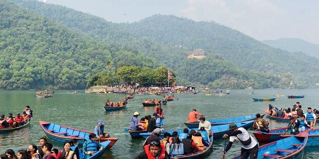 Tourist boating in Phewa Lake
